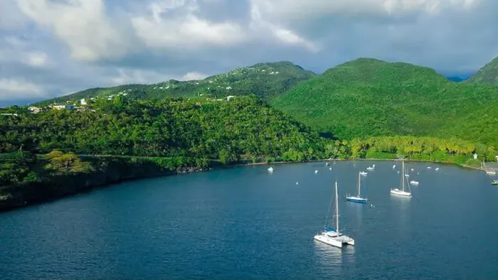Framed Print : Colorful Bay with the Small Boats among the Green Mountains, Guadeloupe island Framed Print : Colorful Bay with the Small Boats among the Green Mountains, Guadeloupe island