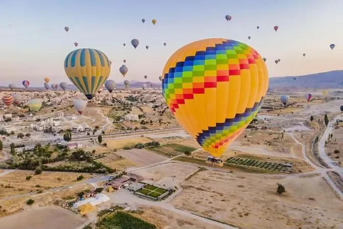 Framed Print : Colorful hot air balloons flying over at fairy chimneys valley in Nevsehir Framed Print : Colorful hot air balloons flying over at fairy chimneys valley in Nevsehir