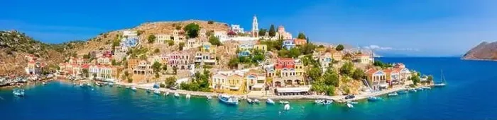 Framed Print : Colorful houses village in Symi island, Dodecanese islands, Greece Framed Print : Colorful houses village in Symi island, Dodecanese islands, Greece