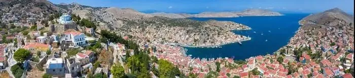 Framed Print : Colorful houses village in Symi island, Dodecanese islands, Greece Framed Print : Colorful houses village in Symi island, Dodecanese islands, Greece