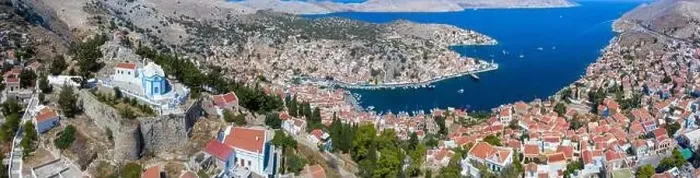 Framed Print : Colorful houses village in Symi island, Dodecanese islands, Greece Framed Print : Colorful houses village in Symi island, Dodecanese islands, Greece