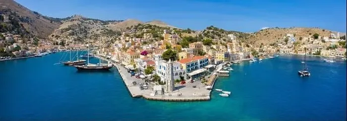 Framed Print : Colorful houses village in Symi island, Dodecanese islands, Greece Framed Print : Colorful houses village in Symi island, Dodecanese islands, Greece