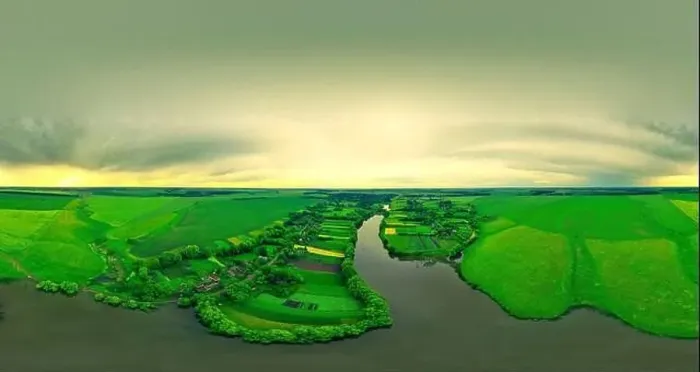 Framed Print : Colorful panorama from a copter over a wide river, fields, meadows. Beautiful panorama at sunset in summer Framed Print : Colorful panorama from a copter over a wide river, fields, meadows. Beautiful panorama at sunset in summer