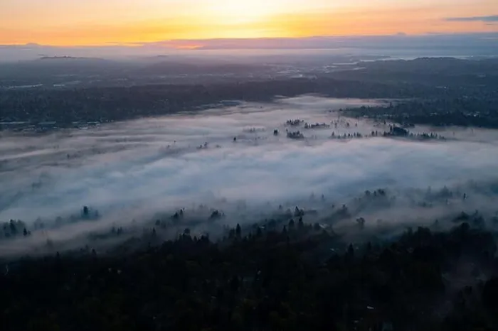 Framed Print : A colorful sunrise illuminates a layer of fog that covers the scenic Willamette River not far south of Portland, Oregon
