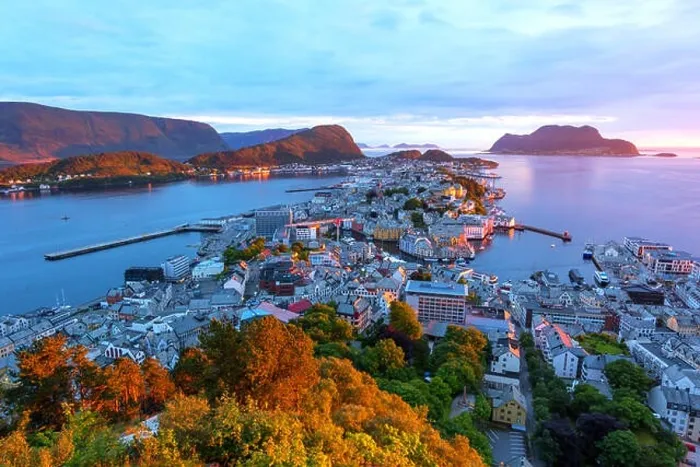 Framed Print : Colorful sunset in Alesund port town on western coast of Norway. Place where the ocean meet the mountains