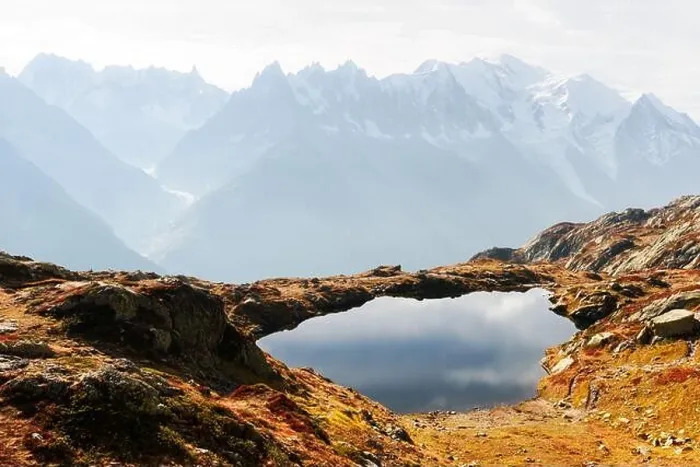 Framed Print : Colourful autumn landscape with Chesery lake (Lac De Cheserys) and snowy Monte Bianco mountains range on background Framed Print : Colourful autumn landscape with Chesery lake (Lac De Cheserys) and snowy Monte Bianco mountains range on background