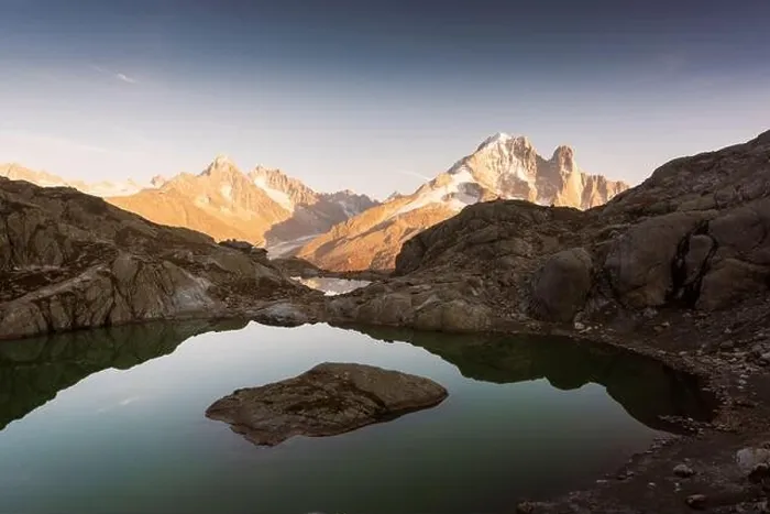 Framed Print : Colourful sunset on Lac Blanc lake in France Alps. Monte Bianco mountain range on background Framed Print : Colourful sunset on Lac Blanc lake in France Alps. Monte Bianco mountain range on background