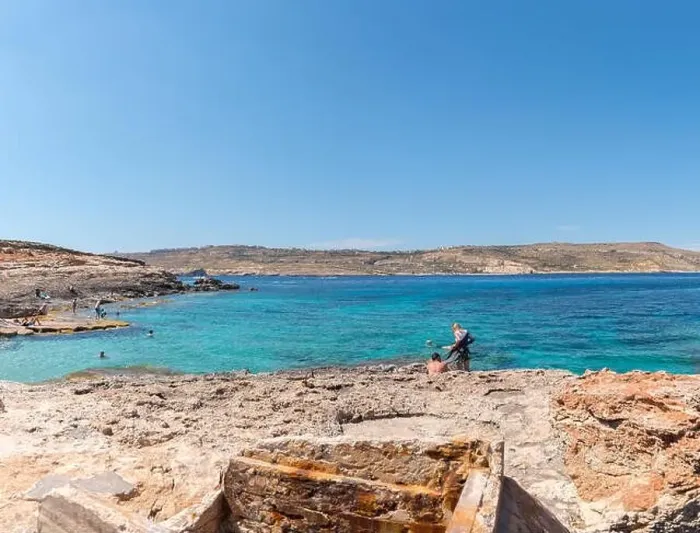 Framed Print : COMINO, MALTA - MAY 24, 2019 Holidays at Blue lagoon on island Comino, Malta Framed Print : COMINO, MALTA - MAY 24, 2019 Holidays at Blue lagoon on island Comino, Malta