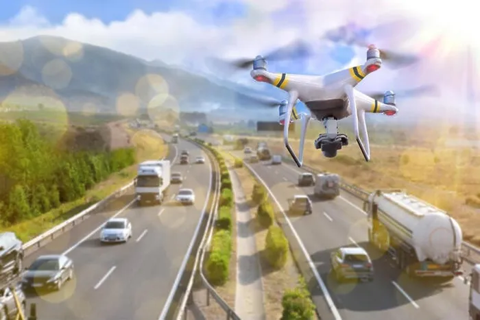 Framed Print : Concept of use of drones for the surveillance and control of traffic on highways Framed Print : Concept of use of drones for the surveillance and control of traffic on highways
