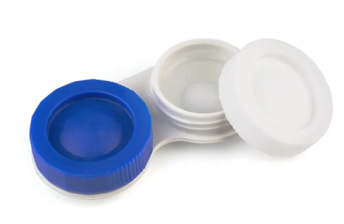 Framed Print : Contact lens in case with solution isolated on white Framed Print : Contact lens in case with solution isolated on white