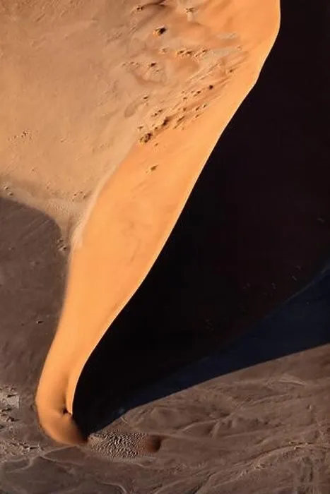 Framed Print : Contrasted abstract of the Oxide rich red sand dunes in the great sand sea of Namibia