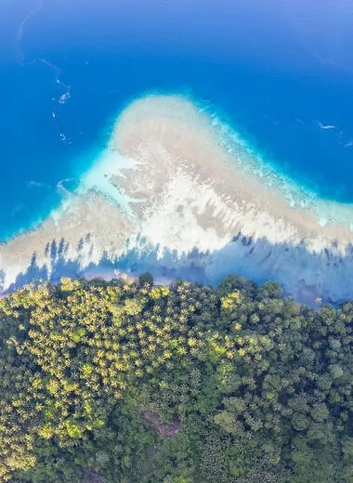 Framed Print : A coral reef surrounds idyllic islands near New Britain in Papua New Guinea. This area is part of the Coral Triangle due to its biodiversity Framed Print : A coral reef surrounds idyllic islands near New Britain in Papua New Guinea. This area is part of the Coral Triangle due to its biodiversity