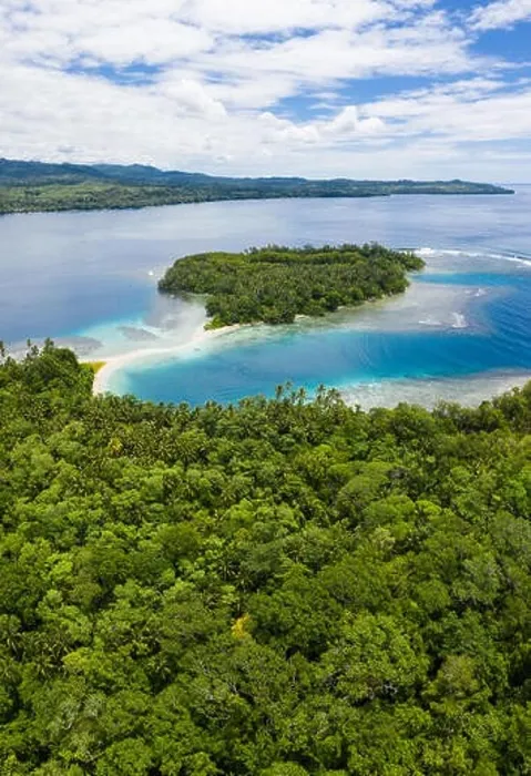 Framed Print : A coral reef surrounds idyllic, tropical islands off the coast of New Britain in Papua New Guinea. This area is part of the Coral Triangle Framed Print : A coral reef surrounds idyllic, tropical islands off the coast of New Britain in Papua New Guinea. This area is part of the Coral Triangle