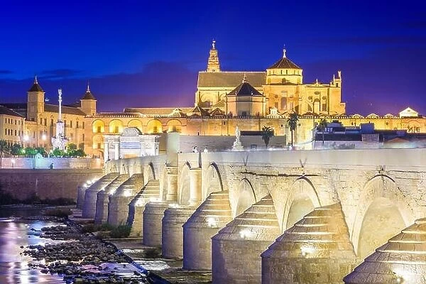 Cordoba, Spain at the Roman Bridge and Mosque-Cathedral on the Guadalquivir River