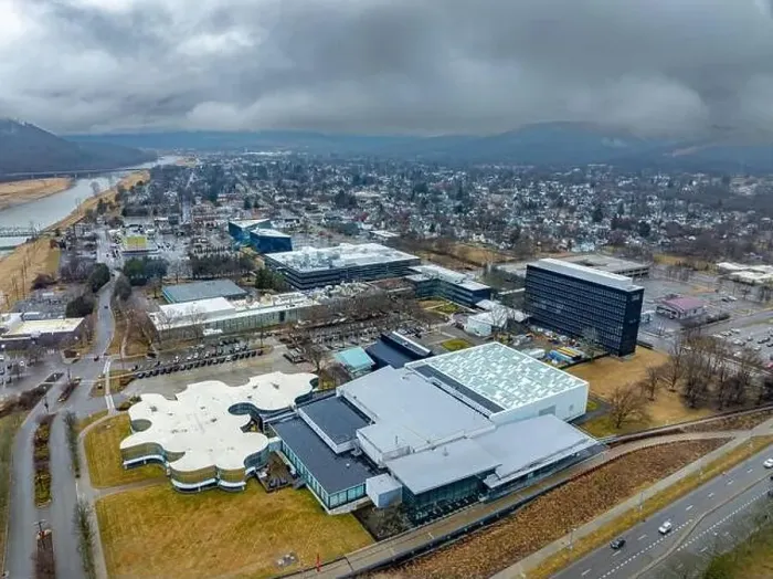 Framed Print : Corning, NY, USA - 03-02-2024 - Cloudy winter aerial image of the downtown area in the City of Corning
