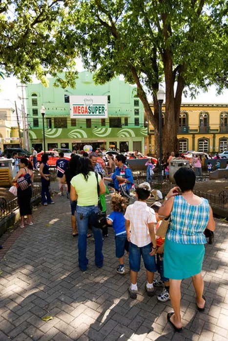 Framed Print : Costa Rica Alajuela Parque Central crowd around itinerant photographer Framed Print : Costa Rica Alajuela Parque Central crowd around itinerant photographer