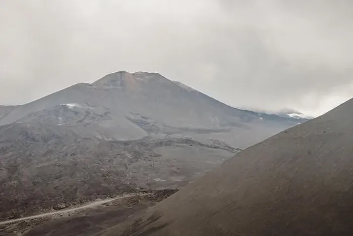 Framed Print : Top of crater Mount Etna volcano, frozen cold lava smokes, thick clouds Framed Print : Top of crater Mount Etna volcano, frozen cold lava smokes, thick clouds