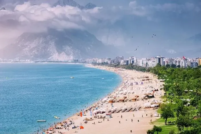 Framed Print : Crowded Antalya city Konyaalti beach with hundreds of vacationers and tourists resting Framed Print : Crowded Antalya city Konyaalti beach with hundreds of vacationers and tourists resting