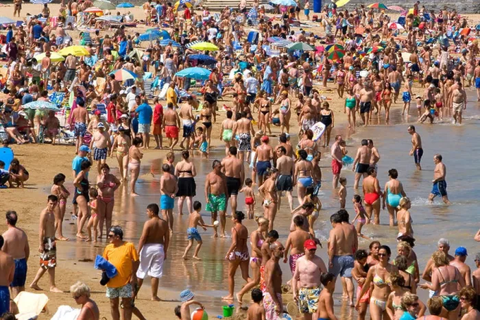 Framed Print : Crowded beach scene at Castro Urdiales Cantabria northern Spain Framed Print : Crowded beach scene at Castro Urdiales Cantabria northern Spain