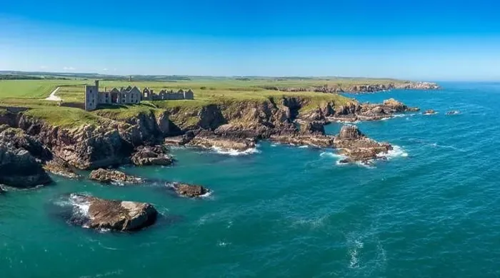 Framed Print : Cruden Bay, United Kingdom - 23 June, 2022: panorama drone view of Slains Castle and the wild coast of Aberdeenshire