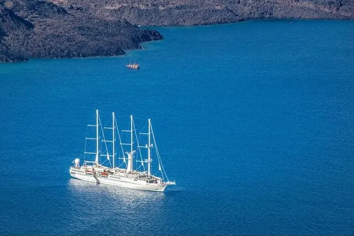 Framed Print : Cruise ship near Santorini, summer travel tourism boats in blue sea bay, cliffs of Santorini volcano island. Famous travel destination Framed Print : Cruise ship near Santorini, summer travel tourism boats in blue sea bay, cliffs of Santorini volcano island. Famous travel destination