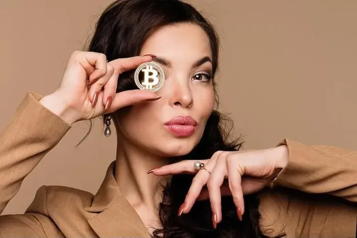 Framed Print : Cryptocurrency and blockchain. Girl shows btc coin holding in front of eye Framed Print : Cryptocurrency and blockchain. Girl shows btc coin holding in front of eye