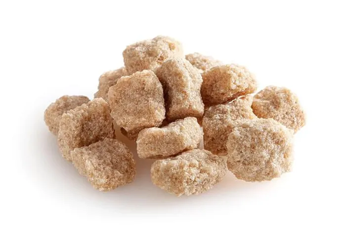 Framed Print : Cubes of brown cane sugar isolated on white background Framed Print : Cubes of brown cane sugar isolated on white background