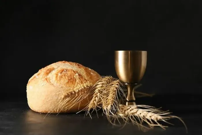 Framed Print : Cup of wine with bread on dark background Framed Print : Cup of wine with bread on dark background
