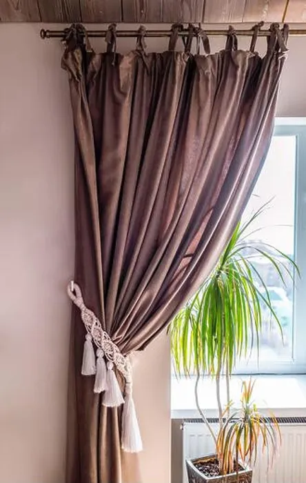 Framed Print : curtain tieback in boho style in interior Framed Print : curtain tieback in boho style in interior