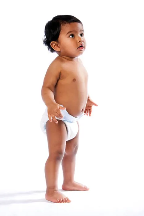 Framed Print : Cute baby toddler standing and looking amazed surprised up wearing diaper, childhood concept Framed Print : Cute baby toddler standing and looking amazed surprised up wearing diaper, childhood concept