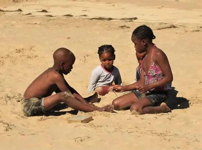 Framed Print : Cute black African kids playing on a beach Framed Print : Cute black African kids playing on a beach