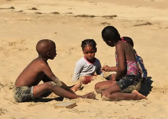 Framed Print : Cute black African kids playing on a beach Framed Print : Cute black African kids playing on a beach