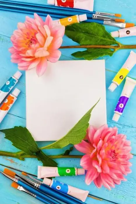 Framed Print : dahlias and a canvas on a blue wooden background. art. Summer background with a space for a text Framed Print : dahlias and a canvas on a blue wooden background. art. Summer background with a space for a text