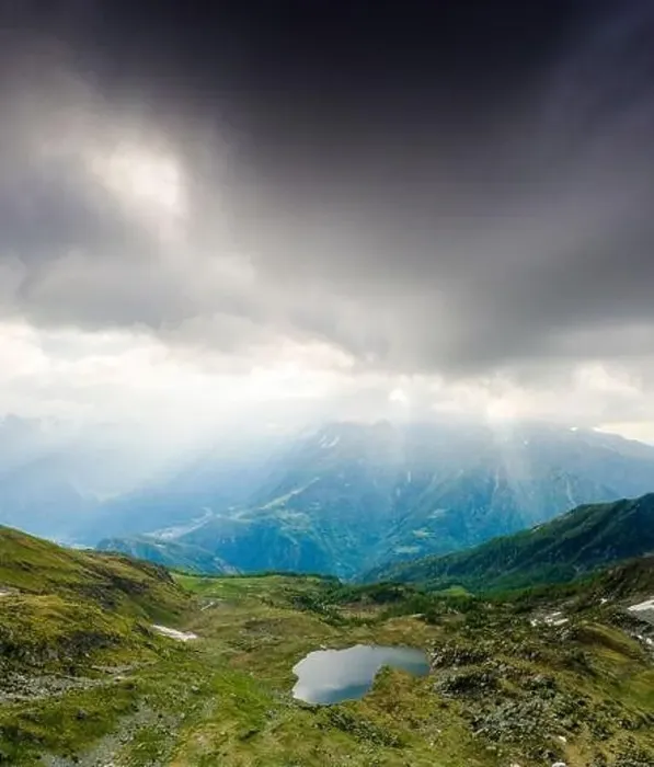 Framed Print : Dark clouds over Arcoglio lake during sunrise, Valmalenco, Sondrio province, Valtellina, Lombardy, Italy Framed Print : Dark clouds over Arcoglio lake during sunrise, Valmalenco, Sondrio province, Valtellina, Lombardy, Italy