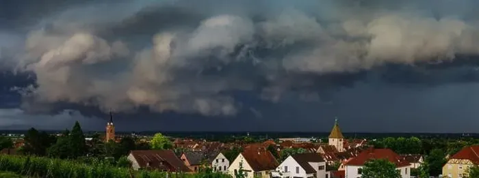 Framed Print : Dark sky, overcast, black clouds. Stormy weather over the village Bergheim. Panoramic view. Alsace, France Framed Print : Dark sky, overcast, black clouds. Stormy weather over the village Bergheim. Panoramic view. Alsace, France