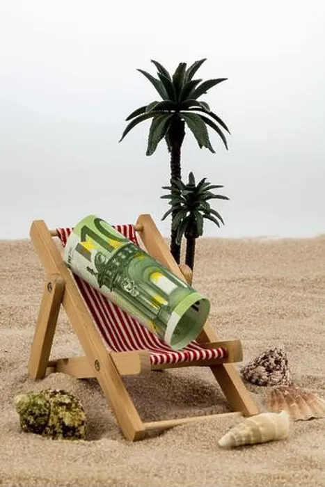 Framed Print : A deckchair with a euro banknote. Symbolic photo for saving on holiday and when travelling Austria Framed Print : A deckchair with a euro banknote. Symbolic photo for saving on holiday and when travelling Austria