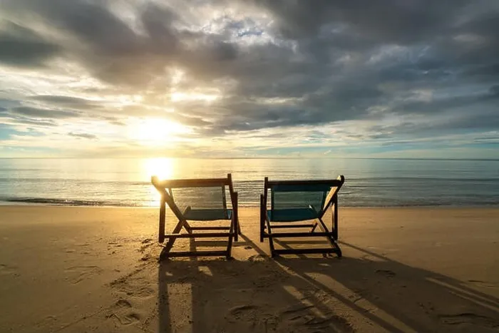 Framed Print : Two deckchairs on the beach at sunset with a tropical sea background. Travel and Vacation in Summer at sea Framed Print : Two deckchairs on the beach at sunset with a tropical sea background. Travel and Vacation in Summer at sea