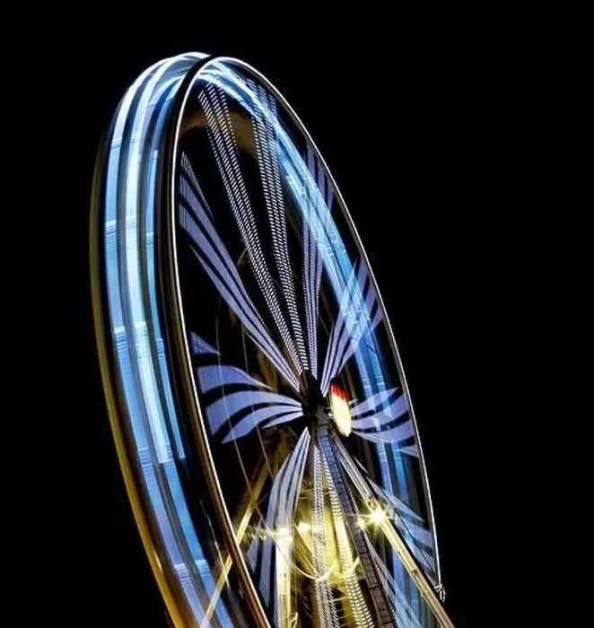 Framed Print : Defocused Ferris Wheel at amusement park at night. Blur abstract spinning wheel background Framed Print : Defocused Ferris Wheel at amusement park at night. Blur abstract spinning wheel background
