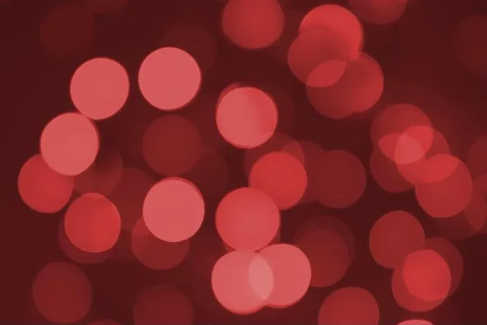 Framed Print : Defocused lights. Red bokeh on black background. Christmas and New year overlay. Copy space Framed Print : Defocused lights. Red bokeh on black background. Christmas and New year overlay. Copy space