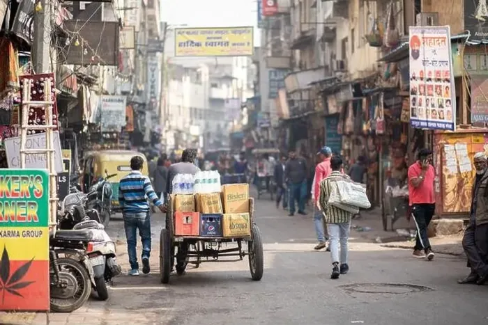 Framed Print : Delhi, India, December 04, 2019: People on busy street at Main Bazaar in Paharganj district Framed Print : Delhi, India, December 04, 2019: People on busy street at Main Bazaar in Paharganj district
