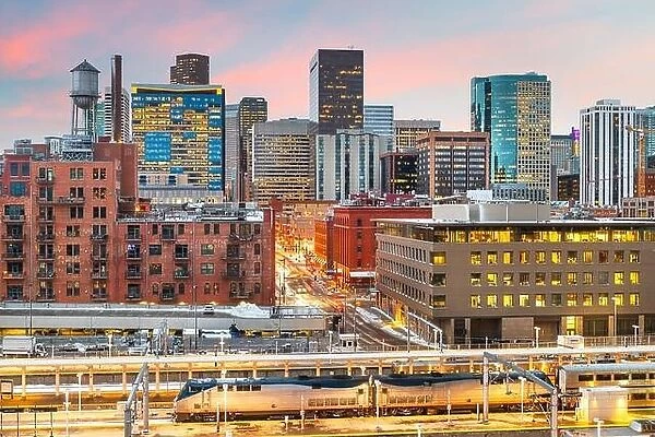 Denver, Colorado, USA downtown cityscape over the train station at twilight