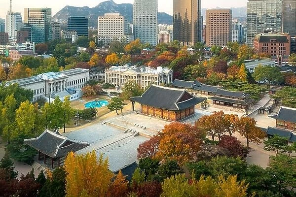 Deoksugung Palace and Seoul city in autumn season in Seoul, South Korea