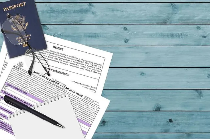 Framed Print : Department of State form DS60 Affidavit Regarding a change of name lies on table and ready to fill Framed Print : Department of State form DS60 Affidavit Regarding a change of name lies on table and ready to fill