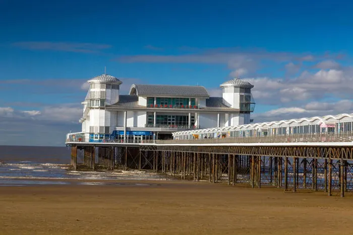 Framed Print : A deserted beach and Grand Pier at low tide in winter at Weston-super-Mare, North Somerset, England, UK Framed Print : A deserted beach and Grand Pier at low tide in winter at Weston-super-Mare, North Somerset, England, UK
