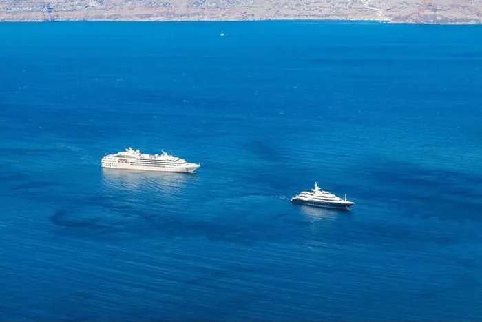 Framed Print : Destination sightseen with cruise ships on Santorini island, Aegean sea bay, Cyclades, Greece. Summer travel vacation, people on cruise ships Framed Print : Destination sightseen with cruise ships on Santorini island, Aegean sea bay, Cyclades, Greece. Summer travel vacation, people on cruise ships