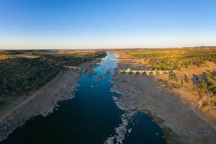 Framed Print : Destroyed abandoned Ajuda bridge drone aerial view, crossing the Guadiana river between Spain and Portugal Framed Print : Destroyed abandoned Ajuda bridge drone aerial view, crossing the Guadiana river between Spain and Portugal
