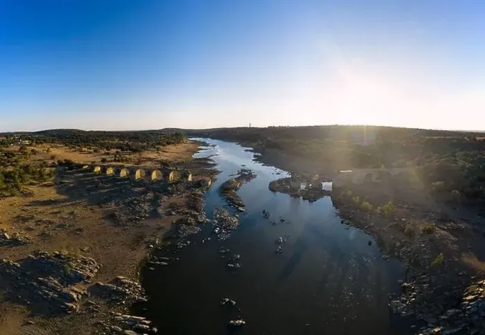 Framed Print : Destroyed abandoned Ajuda bridge drone aerial view, crossing the Guadiana river between Spain and Portugal Framed Print : Destroyed abandoned Ajuda bridge drone aerial view, crossing the Guadiana river between Spain and Portugal