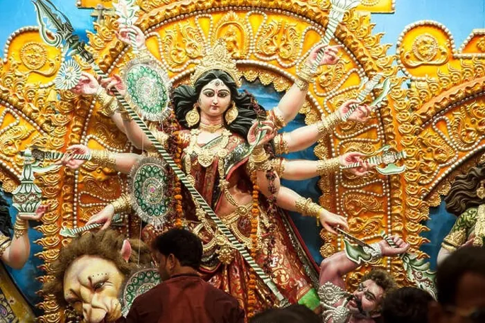 Framed Print : Devotees worshiping the Goddess Durga at nagar bazaar durga puja pandal kolkata west bengal india