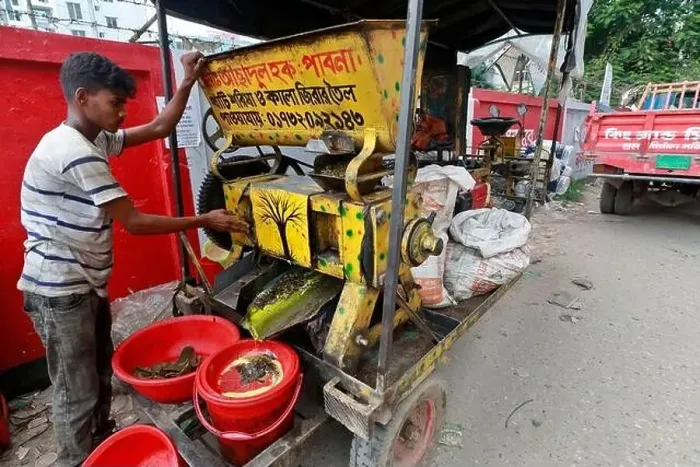 Framed Print : Dhaka, Bangladesh - August 22, 2021: A mustard oil seller in Badda Framed Print : Dhaka, Bangladesh - August 22, 2021: A mustard oil seller in Badda