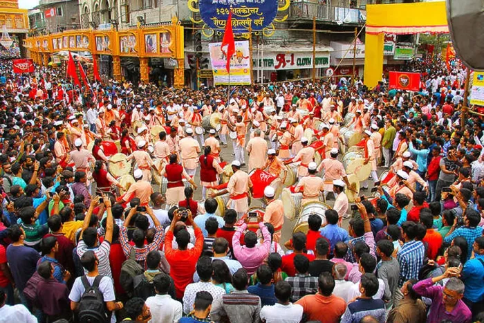 Framed Print : Dhol tasha pathak with crowd celebrating Ganapati festival, Pune Framed Print : Dhol tasha pathak with crowd celebrating Ganapati festival, Pune